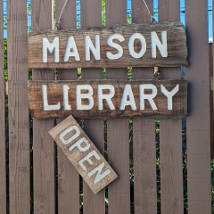 Archie King made this sign for the Manson, Washington library.